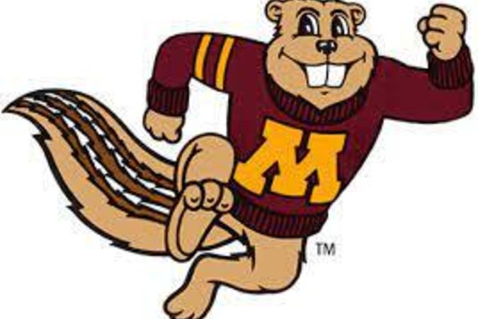 Mascot Goldy Gopher in a UMN maroon and gold sweater running